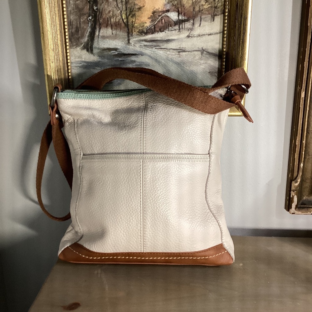 The Sak crossbody…tan with green and brown trim